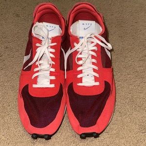 New Men’s Nike red running shoes. Never worn.